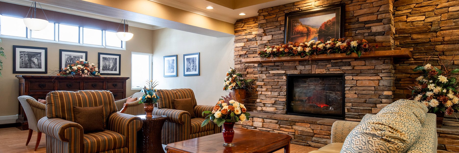 Decorated mantle and fireplace in lobby at Copper Ridge Health and Rehab