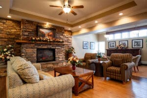 Decorated mantle and fireplace in lobby at Copper Ridge Health and Rehab