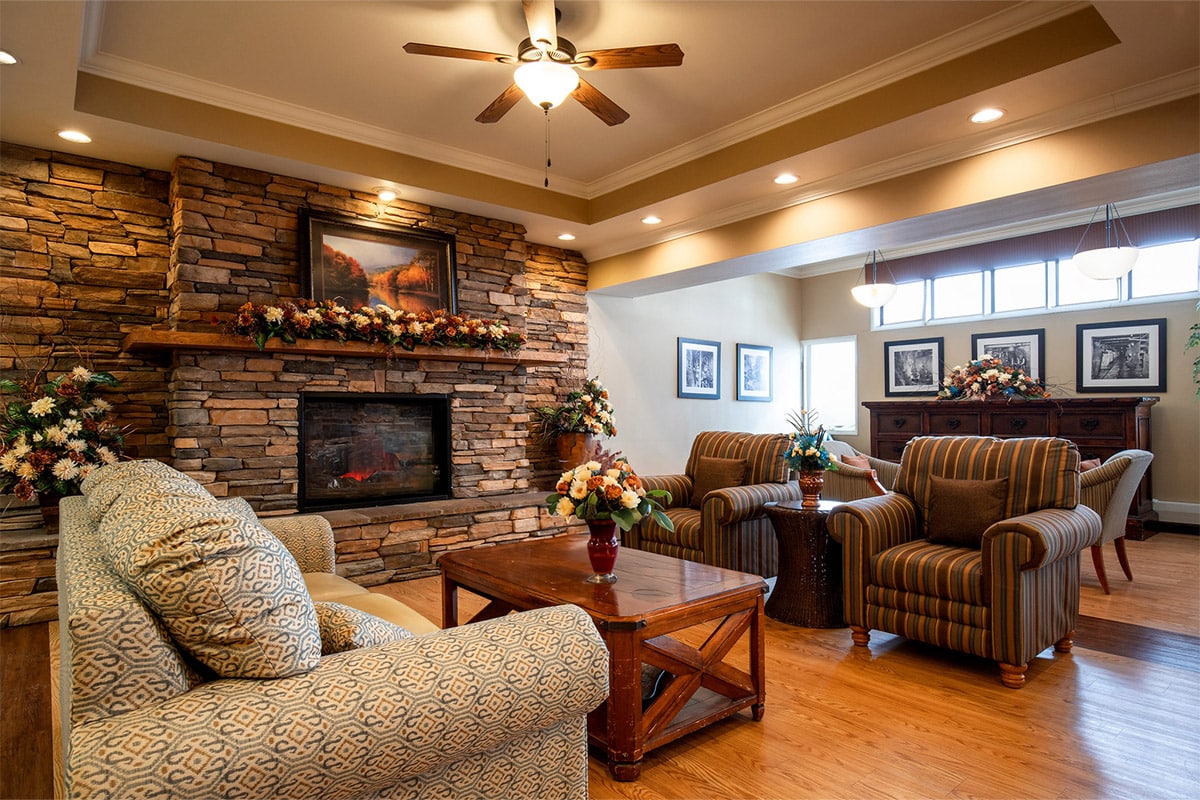 Decorated mantle and fireplace in lobby at Copper Ridge Health and Rehab
