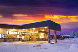 Night time view of the front of building at Copper Ridge Health and Rehab